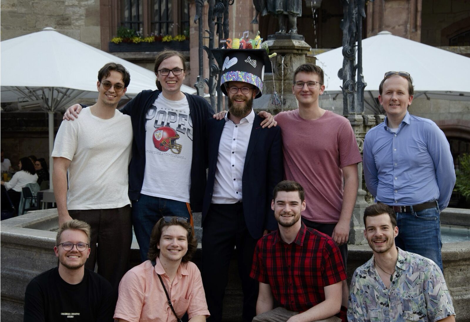 The group at Jonas Isensee's graduation at the Gänseliesel, Göttingen (2025)